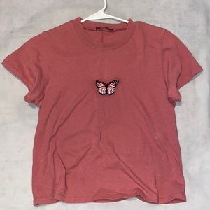 Pink Brandy Melville Shirt! One size but I’m sure it could fit sizes xs-m!